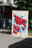 Banners left by the protesters saying: "And the people rises up".
