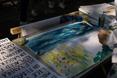 Painting activities at the Ukrainian space in Tiergarten Park.